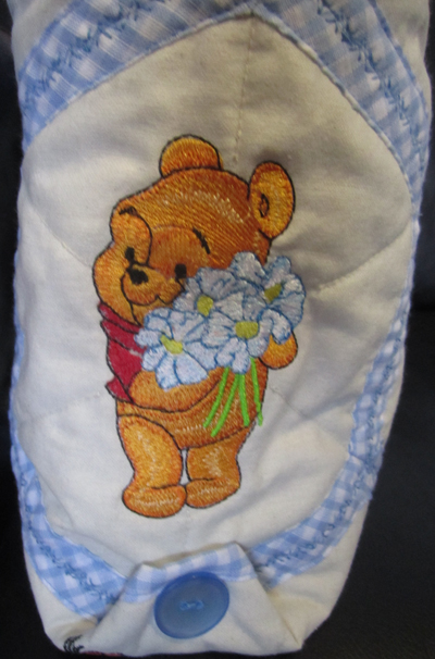 baby pooh with flower embroidery design