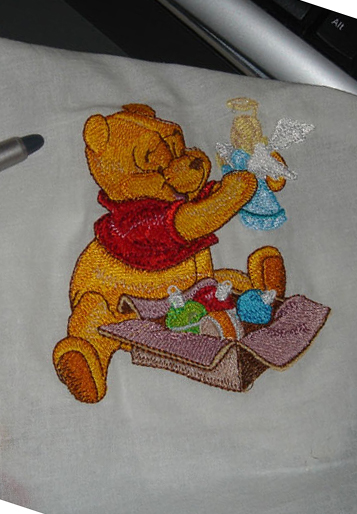 winnie pooh with christmas gift