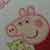 embroidered napkin with Peppa Pig design