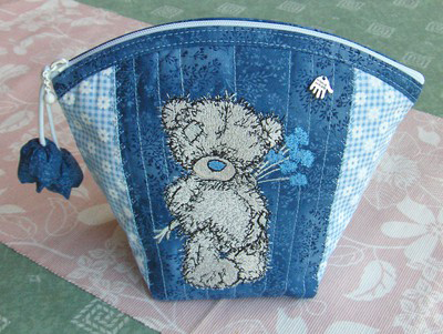 teddy bear with flowers embroidery on toilet bag