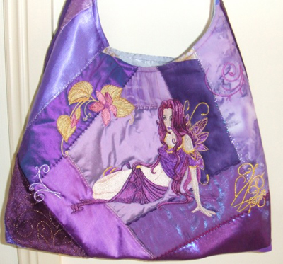 handbag with modern fairy embroidery design