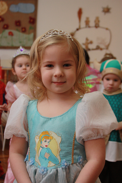 girl and embroidered dress with disney princess design