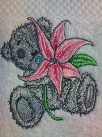teddy bear with lily machine embroidery design