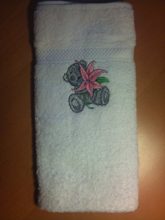 towel with teddy bear design